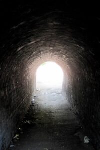 Near-Death Experience Tunnel Meaning: Folklore, Science, and Afterlife Belief